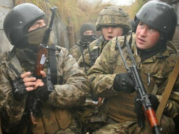 Ukrainian soldiers of the 1st Battalion operate from a reinforced trench along the frontline