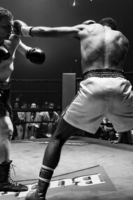 Michael Pitt as Mike Flannigan, fists raised in the heat of battle, is determined to fight not just for victory, but for his redemption in this pivotal moment of his comeback