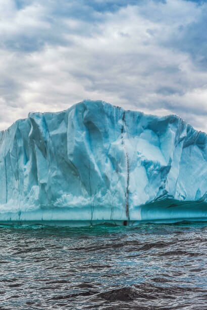 Melting glaciers under sunlight, illustrating the accelerating impact of global warming