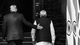 President Donald J. Trump and Indian Prime Minister Narendra Modi walk through the entrance of Hyderabad House in New Delhi on February 25, 2020, before a bilateral program
