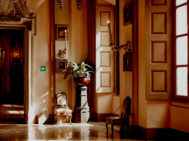 The combination of graceful architecture, beautiful views, stylish chairs, chandeliers, classic décor, and luxury hotel interiors creates an atmosphere of refined elegance