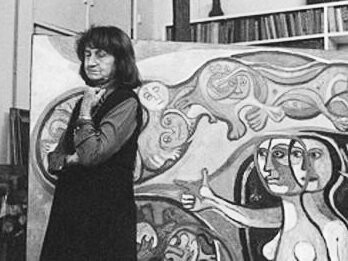 Raquel Forner in her studio, standing before one of her cosmic-infused canvases. 