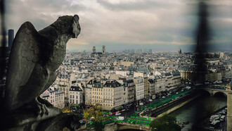 A stunning view of Paris from a window, showcasing the city's iconic landmarks