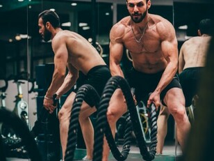 Images of muscular men and fitness influencers often reflect the societal pressure for six-pack abs, contributing to rising concerns around male body dysmorphia