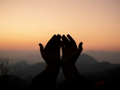 Hands in prayer symbolize peace, hope, faith, and healing, with prayer and scripture serving as powerful tools, while the Armor of God provides spiritual protection and strength