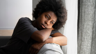 A women feeling the crushing pain of domestic violence and navigating through it