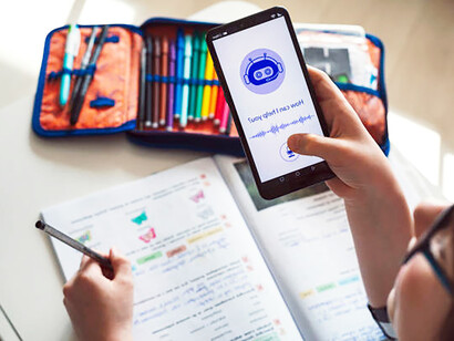 A joyful boy using an AI chatbot on his mobile app, showcasing the impact of futuristic technology in everyday interactions