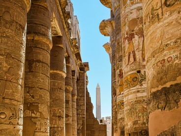 Hieroglyph-covered columns at the Temple of Karnak in Luxor, Egypt
