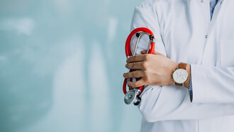 A physician in a medical robe with a stethoscope, embodying the principles of medical ethics, healthcare, and empathy