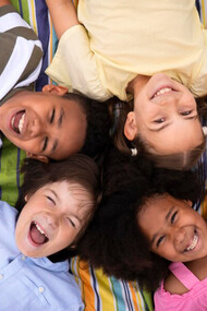 Children relaxing together on the playground