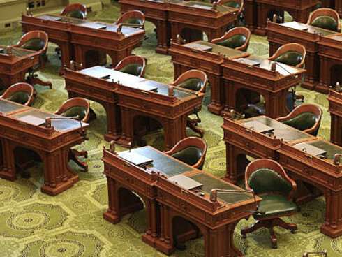 Empty California State Assembly room with vacant chairs, USA