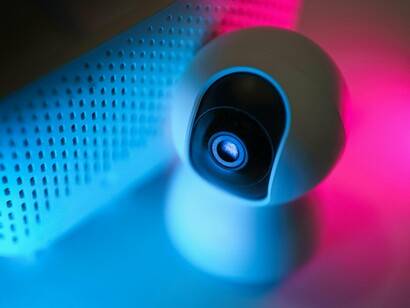 A digitally connected camera designed to monitor homes in real time, symbolizing responsive and intelligent security systems