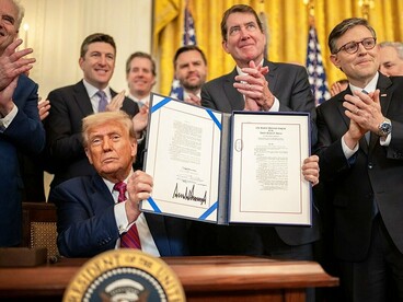 President Donald Trump signs S.1852, The GENIUS Act, Friday, July 18, 2025, in the East Room of the White House