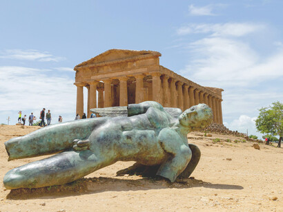 Temple of Concordia in Agrigento, Sicily, with a broken statue of Icarus, Italy