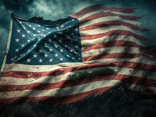 A frayed American flag hangs in quiet testimony to a nation grappling with democratic strain