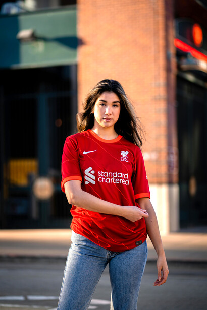 Young woman wearing a Liverpool FC football T-shirt