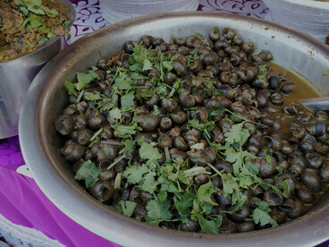 Ghonghi is a Nepalese fresh water snail dish prepared by the Tharu and Madheshi people of southern Nepal