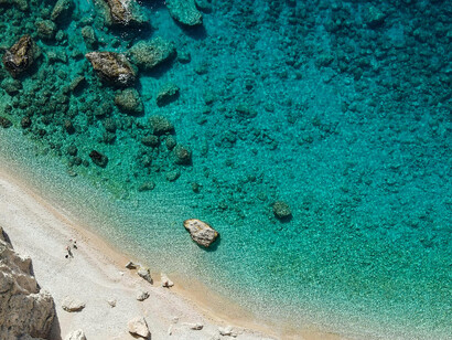 A quiet shoreline that mirrors author’s longing for untraveled roads 