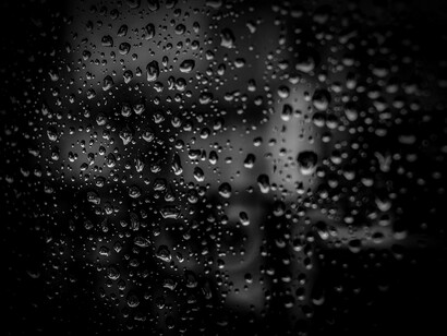 Blurred reflections remind us that meaning, like the world outside, can never be fully grasped