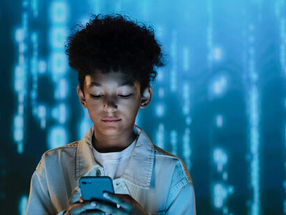 A teenage boy against a digital background, symbolizing AI and fast processing, with an illustration of AI speed