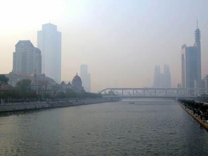 A hazy skyline reflects the environmental cost of decades of rapid economic growth in China