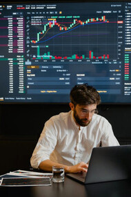 A data analyst dives deep into the intricacies of the tech stack, using real-time graphs to translate raw data into actionable insights for strategic decision-making