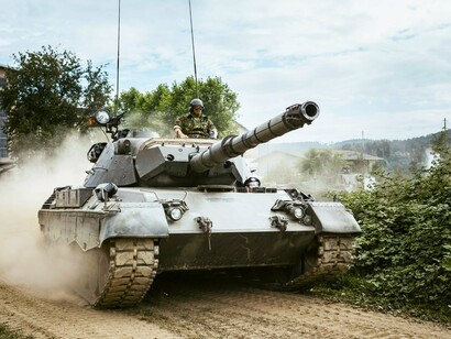 While the planet burns and people suffer, humanity still invests in tanks over peace