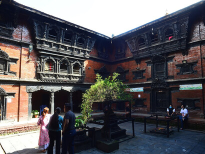 South of the renowned Hanumandhoka Durbar Square in Kathmandu, near Basantapur Durbar, stands the intricately designed Kumari House, a masterpiece of traditional architecture, Nepal