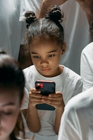 Young couple addicted to their phone screens