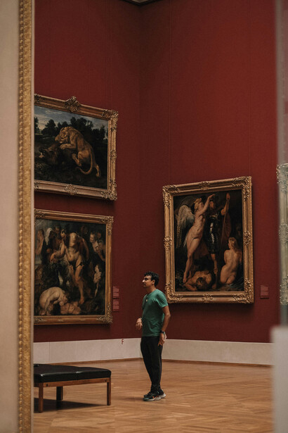 Munich, Bavaria, Germany, a man looking at paintings in a museum