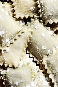 Turkish mantı dusted with flour