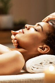 The therapeutic touch of an Ayurveda practitioner provides holistic healing, focusing on restoring harmony between mind, body, and spirit