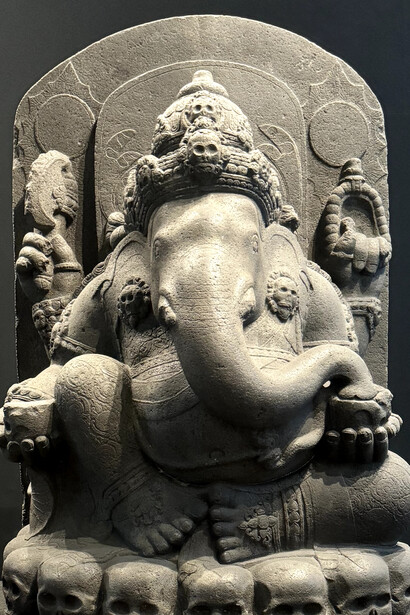 A close-up of Ganesha, the elephant-headed Hindu deity, displayed alongside other repatriated artifacts at the Indonesia National Museum in Jakarta, Indonesia, showcasing the fine details and artistry that survived centuries of displacement