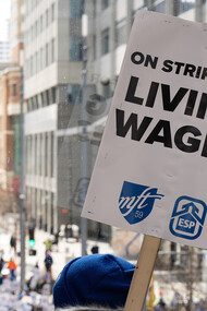 Educators from Minneapolis schools march through downtown Minneapolis, USA