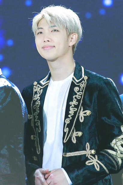 Min Yoon-gi, professionally known as SUGA and Agust D, is a South Korean rapper, songwriter, and record producer renowned for his introspective lyrics and versatile musical style