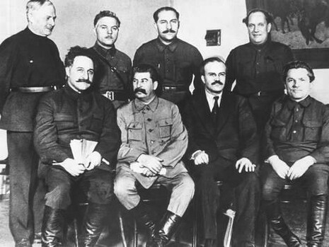 Delegates of the party and Soviet leadership at the 17th Congress of the All-Union Communist Party (Bolsheviks): seated (left to right) Sergo Ordzhonikidze, Joseph Stalin, Vyacheslav Molotov, Sergei Kirov; standing Abel Yenukidze, Kliment Voroshilov, Lazar Kaganovich, and Valerian Kuibyshev