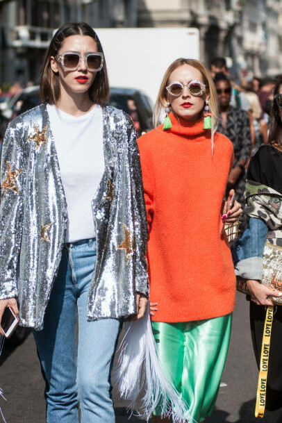 Fashion enthusiasts gather to attend the exciting Milan Fashion Week, enjoying a showcase of the latest trends and innovative designs presented on the runway, Italy