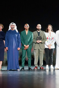 Nasser Alzayani (centre), announced as winner of 2021 Richard Mille Art Prize at Louvre Abu Dhabi, with HE Mohamed Khalifa Al Mubarak, the Abu Dhabi Chairman of Department of Culture and Tourism, H.E. Saood Abdulaziz Al Hosani, Manuel Rabaté, Director of Louvre Abu Dhabi, Peter Harrison, CEO Richard Mille, and Pharrell Williams, pop-singer and Richard Mille ambassador Courtesy Richard Mille Press Office