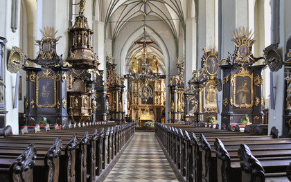 St. Catherine's Church (Polish: Kościół św. Katarzyny, German: Katharinenkirche) is Gdańsk’s oldest church, begun in the 1220s and later expanded with Gothic chapels, a gabled roof, and vaulted ceilings, Poland