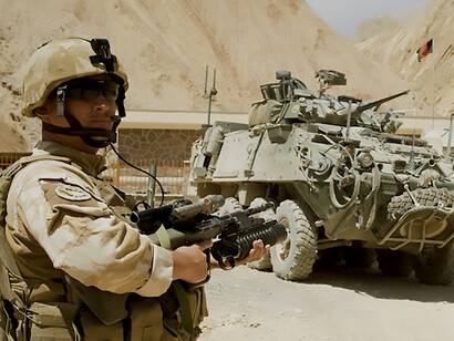 An American soldier on patrol during military operations in Iraq