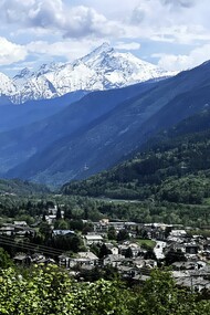 Mont Blanc, towering above the Val d’Aosta region, provides a majestic backdrop to the ancient village of Morgex © Donatella Polizzi