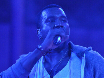 On November 21, 2013, Kanye West performs on a mountain stage at the Verizon Center in Washington, D.C., as part of The Yeezus Tour