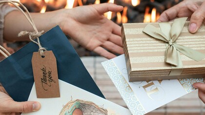 A small thank-you present exchanged between two people, symbolizing appreciation made visible and heartfelt