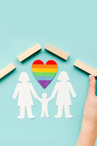 A composition representing the concept of LGBTQ+ families, set against a blue background