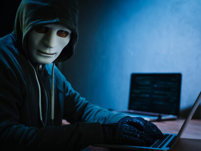 A hacker monitoring digital networks, navigating cyber warfare, and securing data in the ever-evolving cybersecurity landscape