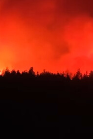 A devastating wildfire burned through the night in February in El Bolsón, Río Negro, Argentina, illuminating the sky with its intense glow