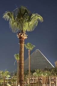 A captivating view of Egypt's iconic Giza Pyramids at night