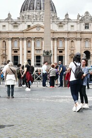 Sara Terracina jogging through Saint Peter's Square, Rome, Italy 
