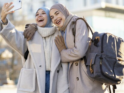 Two women experiencing a new place side by side, illustrating the friendships and global perspectives that cultural exchange programmes foster
