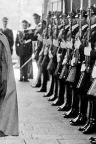Augusto Pinochet reviews troops inside the presidential palace in Santiago, Chile in 19